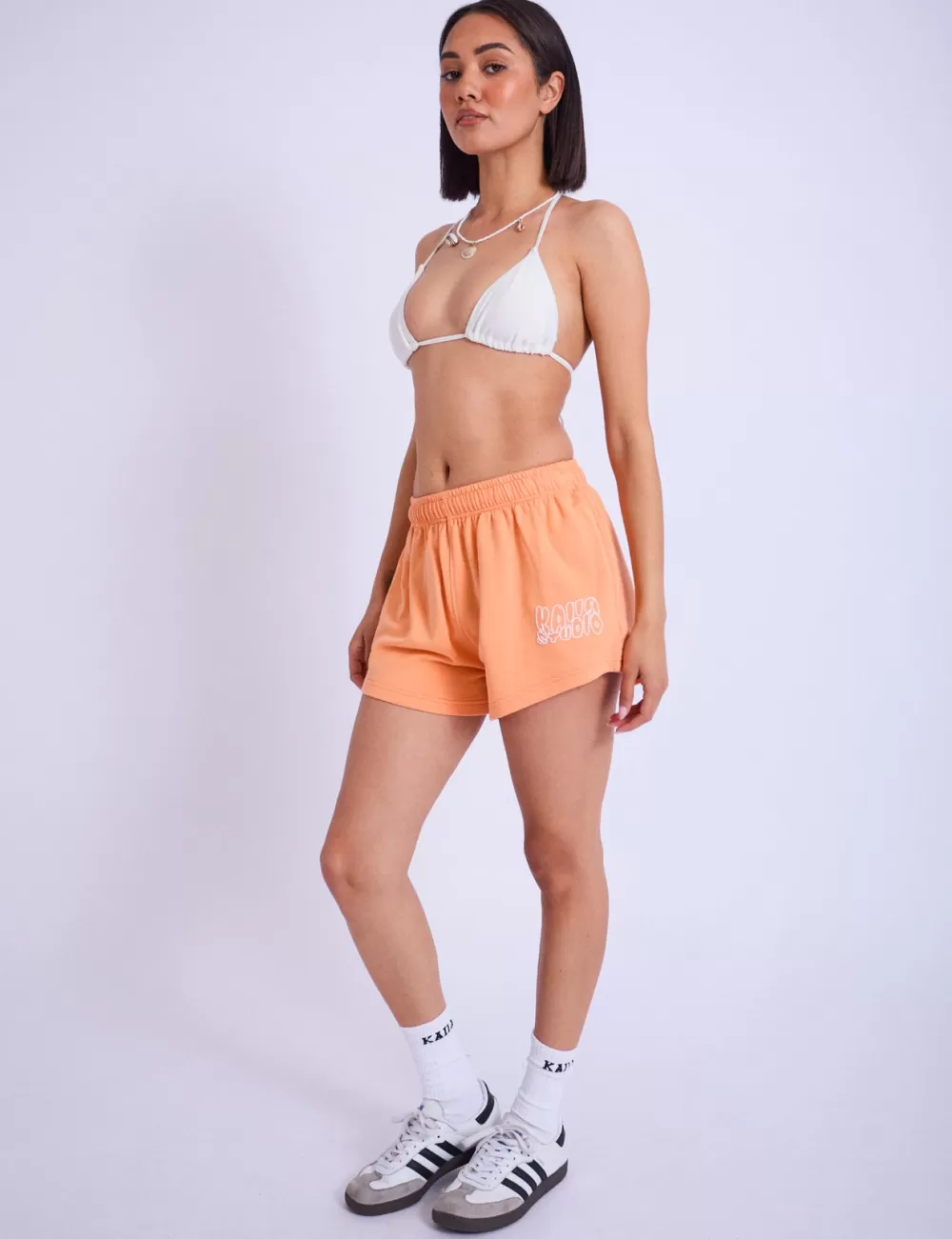 Shop Public Desire Kaiia Studio Bubble Logo Mini Sweat Shorts Light Orange
