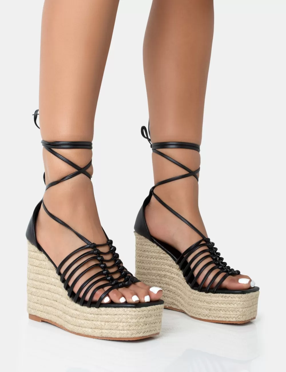 Shop Public Desire Reece PU Knot Strap Lace Up Raffia Wedge Heels Black